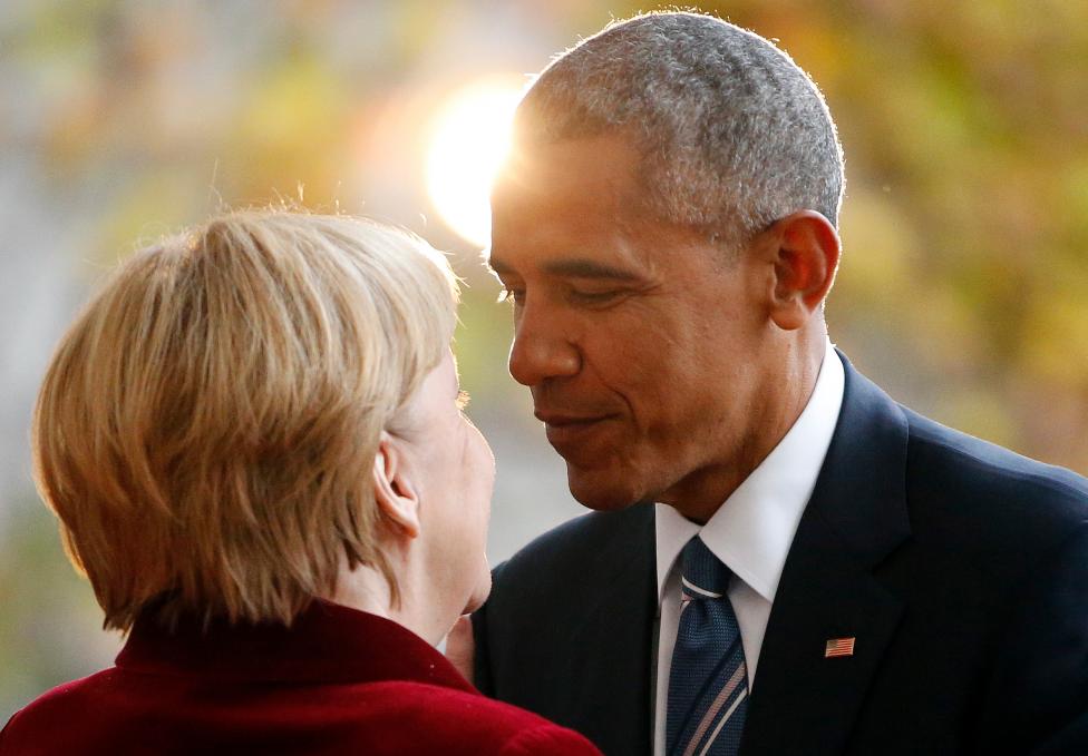 U.S. President Obama is welcomed by German Chancellor Merkel upon his arrival at the chancellery in Berlin